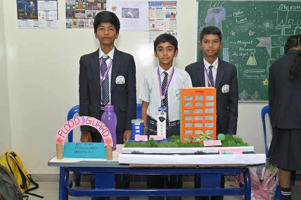 Middle School students with a science project at St. Philomena's